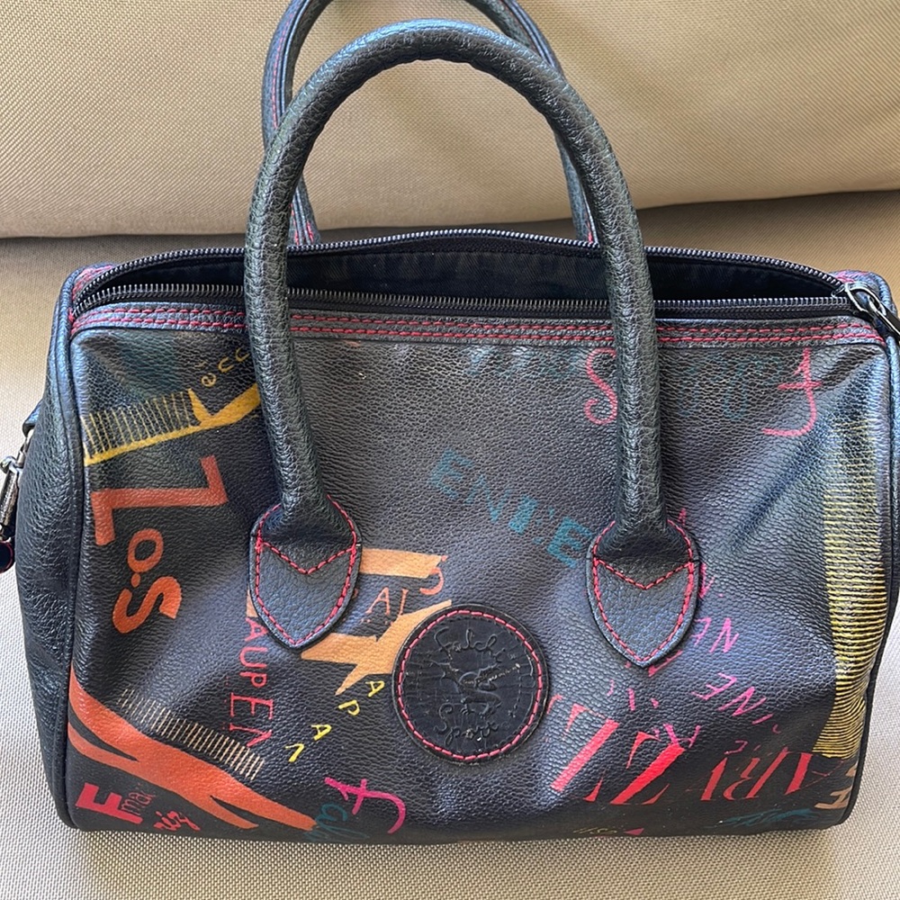 Falchi sport   5.5w x 6l 1 inside pocket.   Minor flaw handle last picture